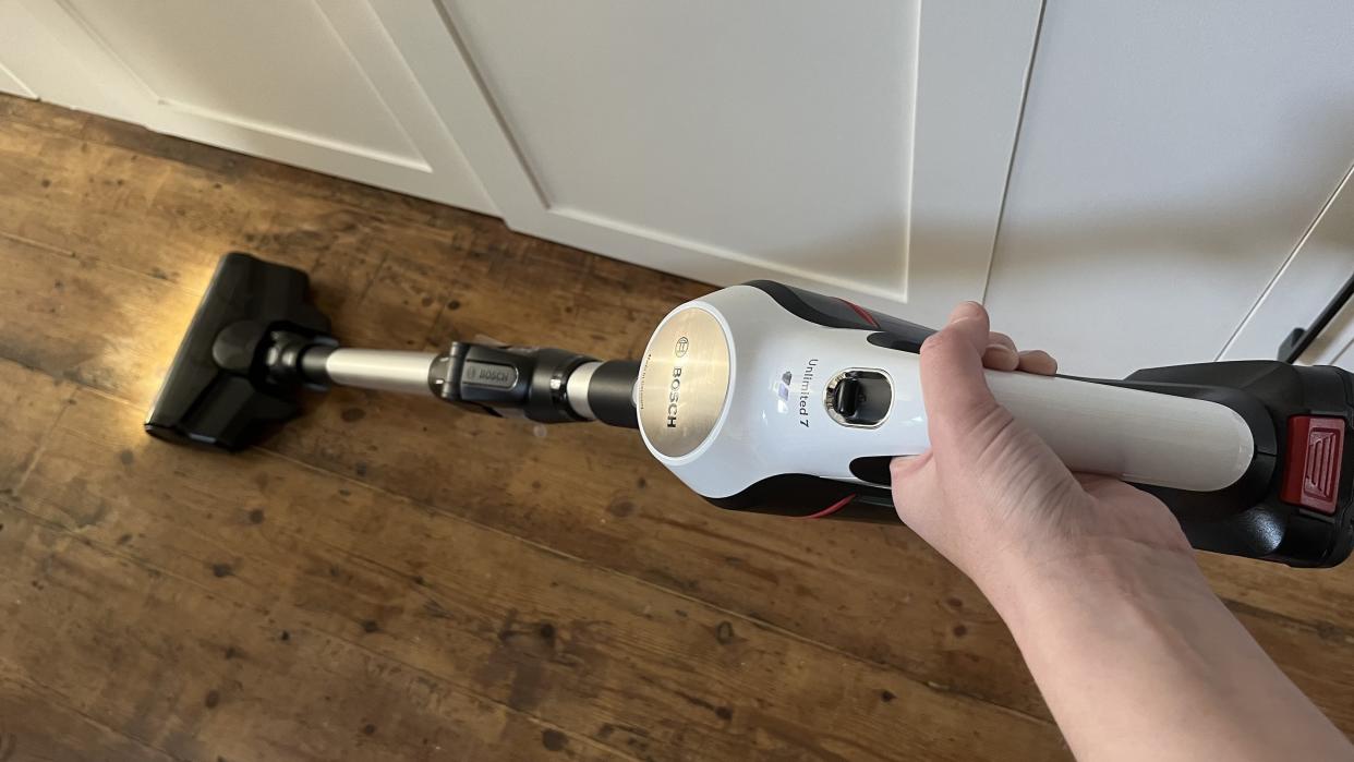  bosch vacuum cleaner being used on hard flooring during a review for techradar 