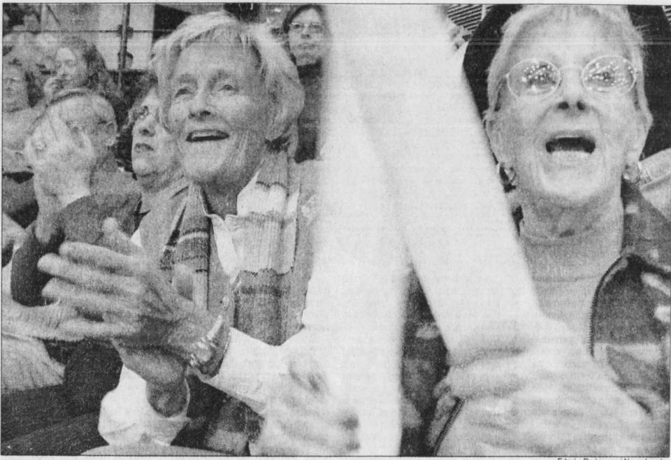 Joyce Mahoney (left) and Bee Payne-Stewart cheer at an SMS men's basketball game. Mahoney, who was born in 1930, says: "I was so envious of what the boys could do. They could play sports and they looked like they were having so much fun."