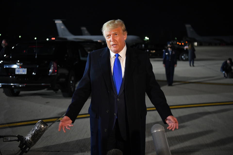 US President Donald Trump speaks to reporters upon arrival at General Mitchell International Airport in Milwaukee, Wisconsin on October 24, 2020. (Photo by MANDEL NGAN / AFP) (Photo by MANDEL NGAN/AFP via Getty Images)