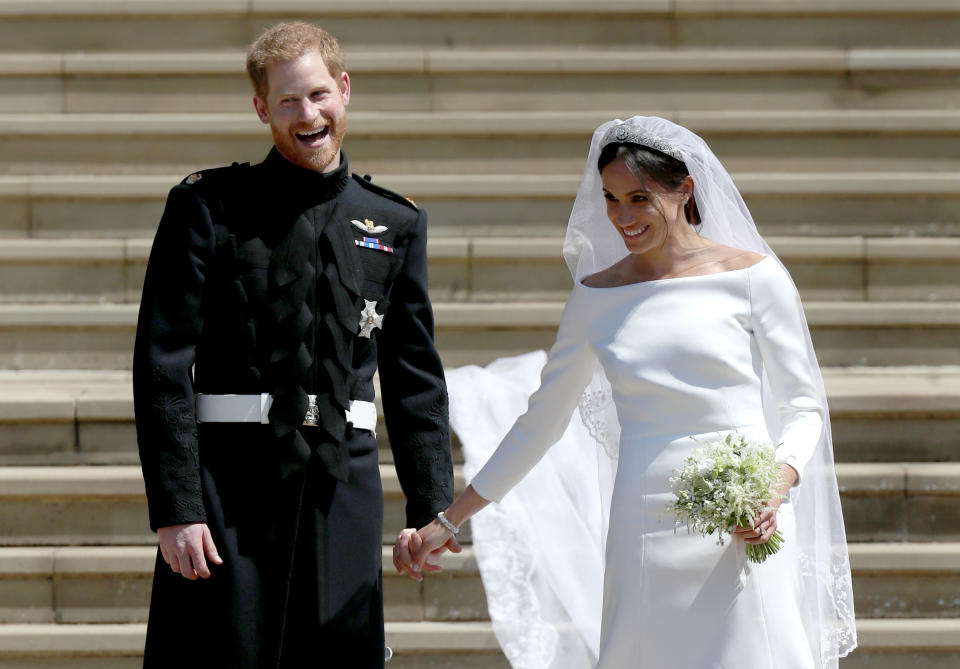 WINDSOR, UNITED KINGDOM - MAY 19:  Prince Harry, Duke of Sussex and the Duchess of Sussex depart after their wedding ceremonyat St George's Chapel at Windsor Castle on May 19, 2018 in Windsor, England. (Photo by Jane Barlow - WPA Pool/Getty Images)