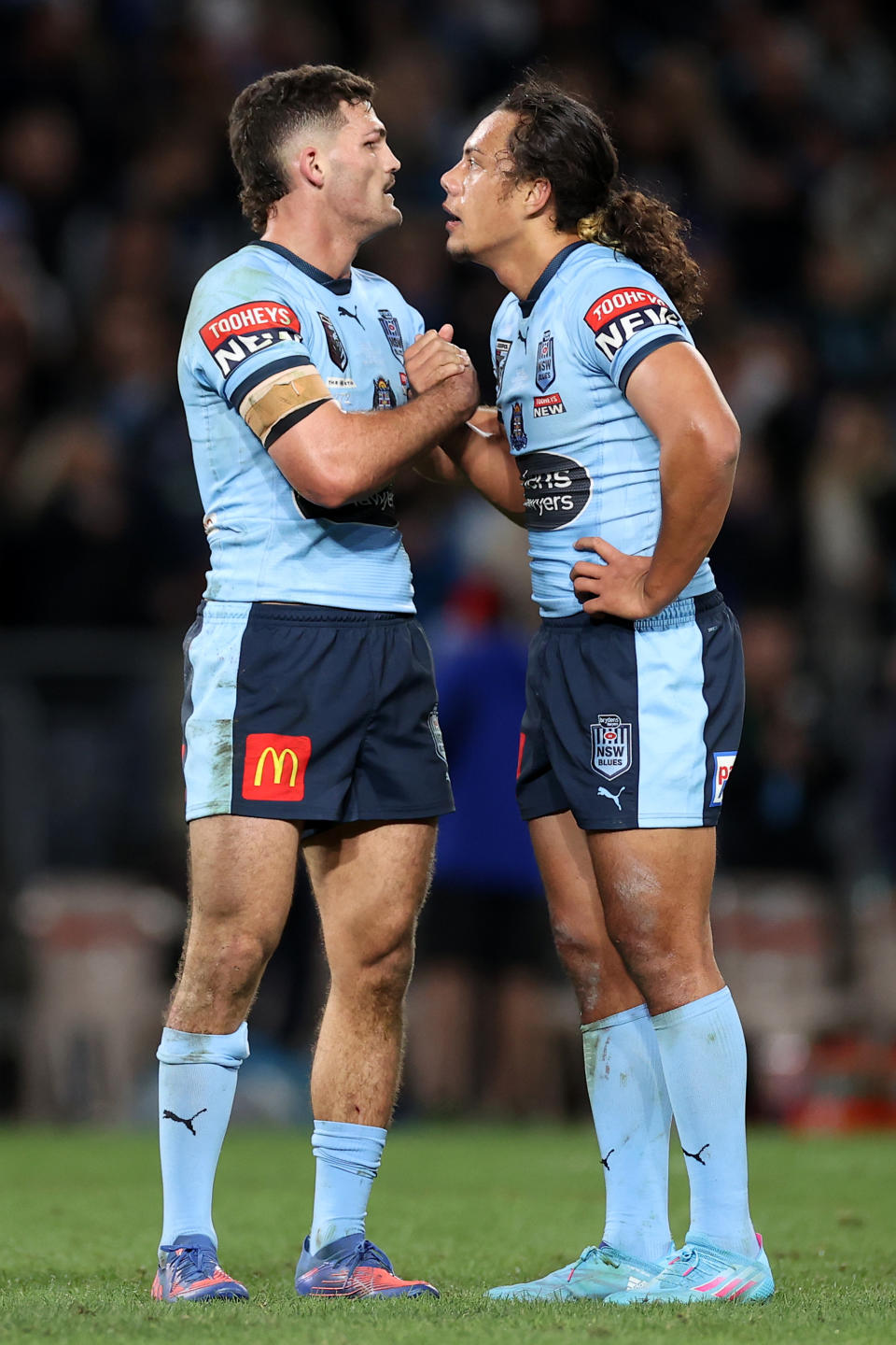 Nathan Cleary and Jarome Luai embrace in State of Origin.