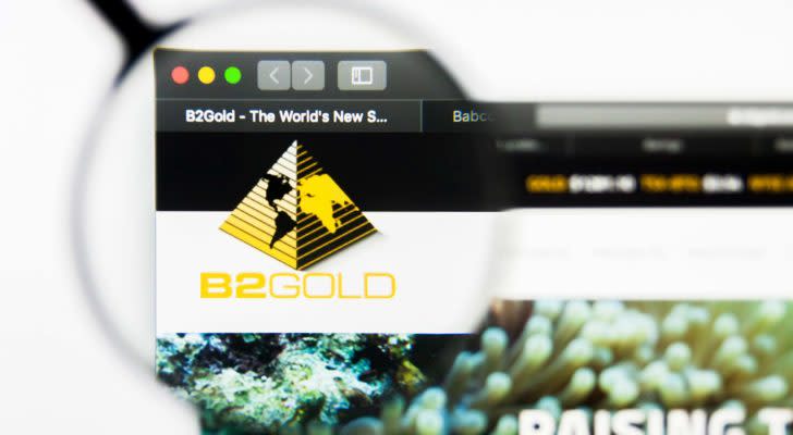 Веб браузердеги b2gold (BTG) логотиби лупа менен чоңойтулган