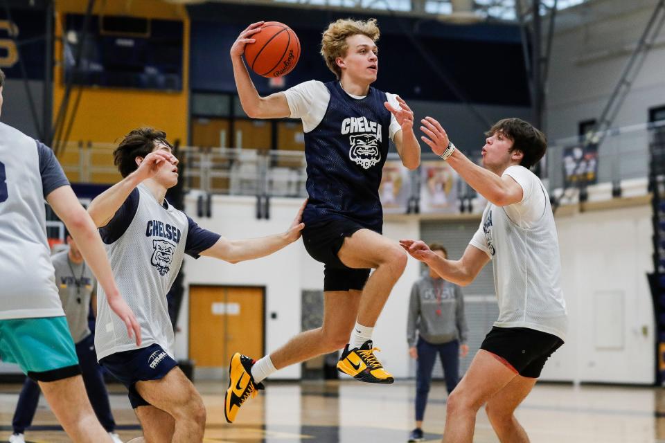 Chelsea basketball player Joey Cabana, center, makes a layup during practice at Chelsea High School in Chelsea on Thursday, Jan. 5, 2023.