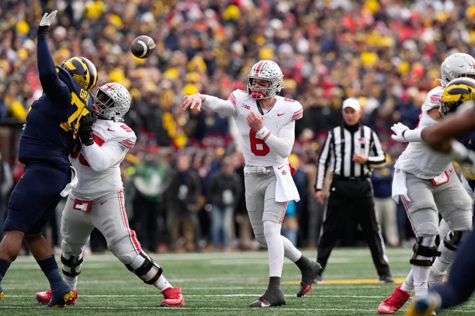 Nov 25, 2023; Ann Arbor, Michigan, USA; Ohio State Buckeyes quarterback Kyle McCord (6) throws a pass during the first half of the NCAA football game against the Michigan Wolverines at Michigan Stadium.