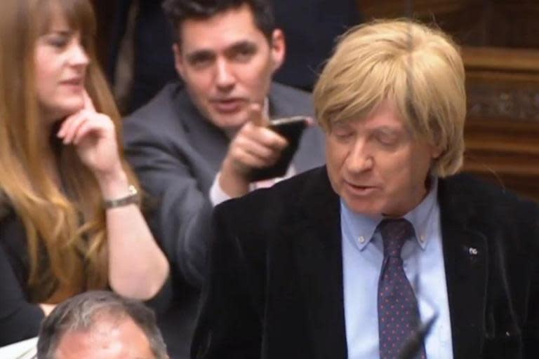 Moment Tory MPs appear to mock Michael Fabricant behind his back for 'wearing a wig' during PMQs