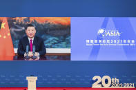 In this photo released by Xinhua News Agency, Chinese President Xi Jinping delivers a keynote speech via video for the opening ceremony of the Boao Forum for Asia (BFA) Annual Conference held in Boao in south China's Hainan Province, Tuesday, April 20, 2021. Xi on Tuesday called for more equitable management of global affairs and, in an implicit rejection of U.S. dominance, said governments shouldn't be allowed to impose rules on others. (Li Tao/Xinhua via AP)