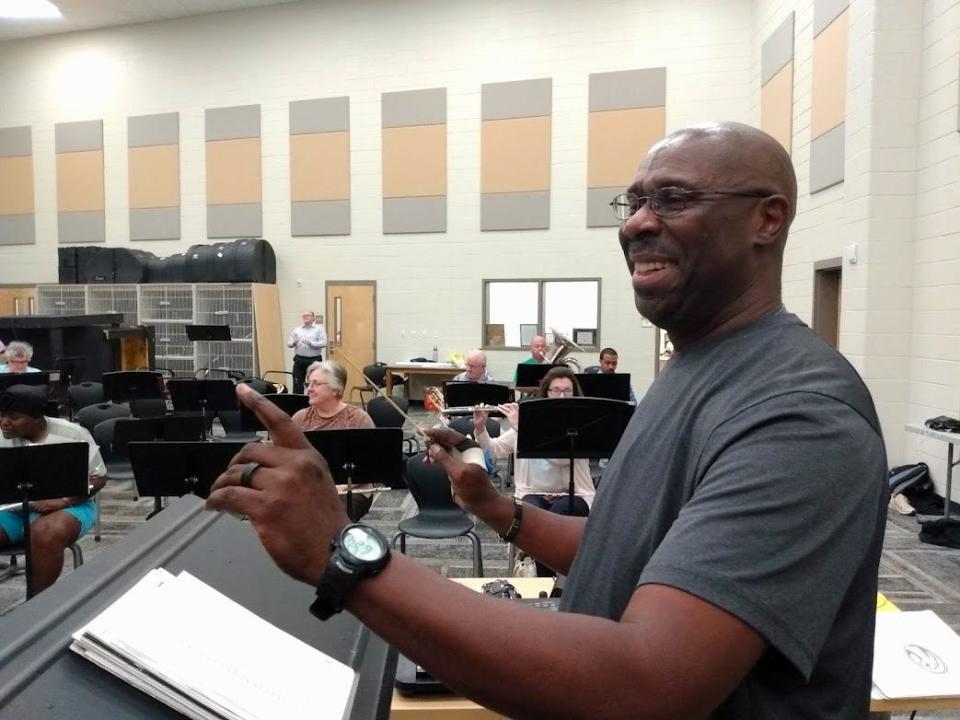 Mississippi Community Symphony Band conductor Dr. Paxton Girtmon prepares for a rehearsal Tuesday evening. The band practices at Northwest Rankin High School and performs at the Belhaven University Center for the Arts on Riverside Drive in Jackson.