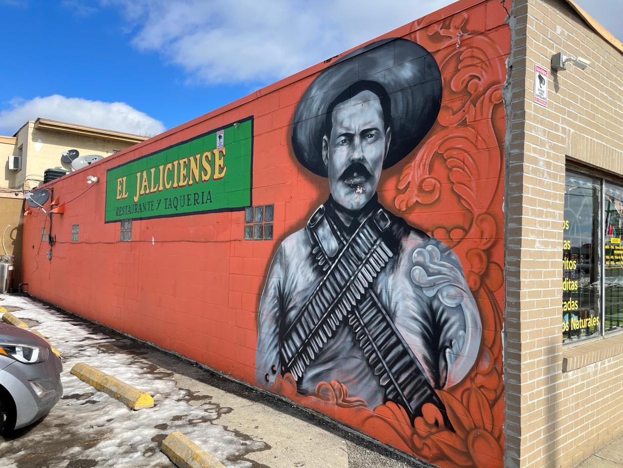 El Jaliciense on Sullivant Avenue is a Mexican restaurant with a colorful mural on the west side of the building.
