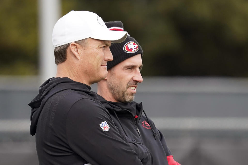 San Francisco 49ers head coach Kyle Shanahan, right, and general manager John Lynch have big QB decisions coming this offseason. (AP Photo/Tony Avelar)