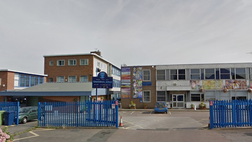 Entrance to school with blue gates