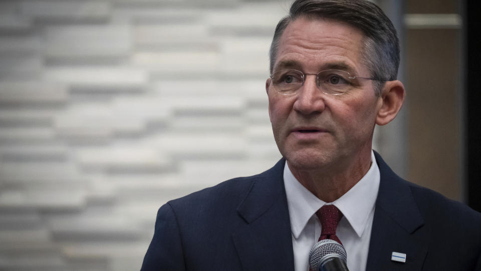 North Dakota Attorney General Drew Wrigley speaks during a news conference on Friday, July 21, 2023 in Fargo, N.D. The man who shot three Fargo police officers and a civilian, killing one of the officers before an officer killed him, searched the internet for terms including “explosive ammo” and “kill fast,” as well as for what crowded area events might be happening in and around North Dakota's largest city, authorities said Friday. ( KFGO via AP)