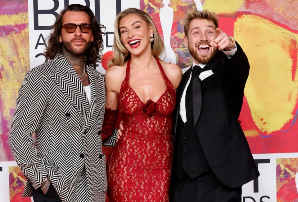 Pete Wicks, Zara McDermott, Sam Thompson posed up a storm on the red carpet (AFP via Getty Images)