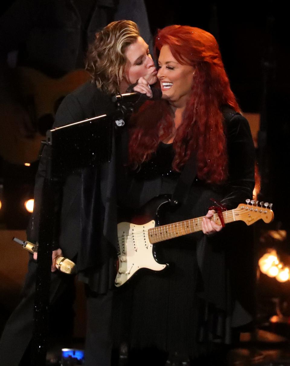 The Judds, featuring Wynonna Judd (right) joined by special guests such as Brandi Carlile (left) will visit Tampa's Amalie Arena on Feb. 24.