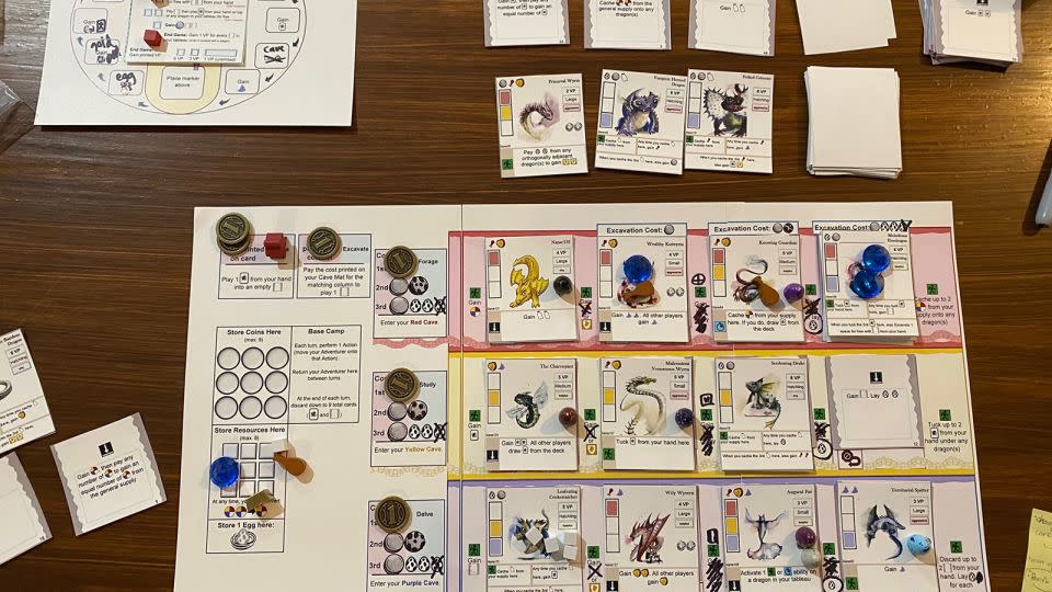 A paper prototype of Wyrmspan in the middle of a playtest session. - Courtesy Connie Vogelmann