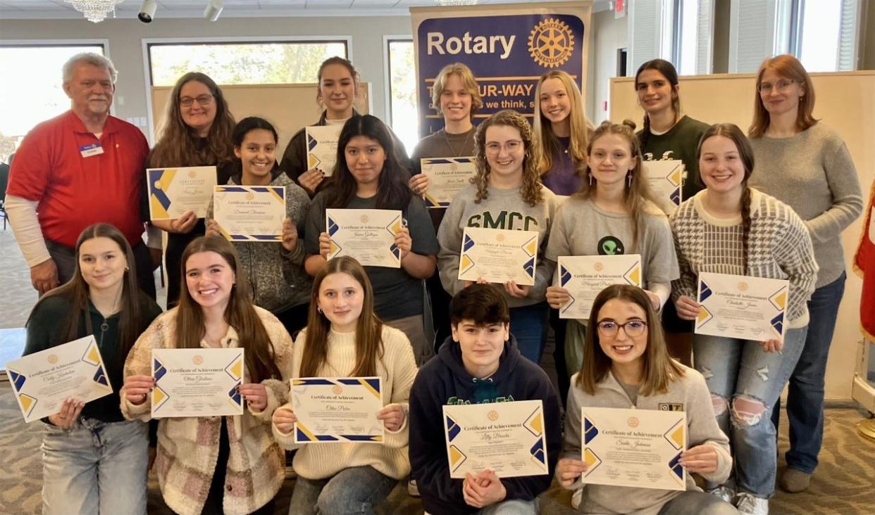 Interact Club members from St. Mary Catholic Central are: Charlotte Jones, president of the SMCC Interact Club; Ana Cuccia; Chloe Lohmeyer; Margaret Prohaska; Abigayle Brown; Sadie Johnson; and Jacob Smith. Lilly Duran is not pictured. Interact Club members from Monroe High School are: Christina Rice, president of the MHS Interact Club; Lilly Brooks; Jessica Gallegos; Olivia Gladieux; Julia Puruleski; Carly Kuehnlein; Diamond Thompson; and Chloe Pabin. Megan Scaggs (top row, far right) is moderator of the SMCC Interact Club. Sue Jones (top row, second from left) is moderator of the MHS Interact Club. George (Pat) Barley (top row, far left) is the Rotary Club liaison for the two Interact Clubs.