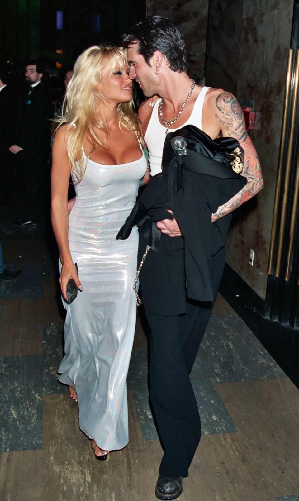 Pamela Anderson and Tommy Lee during 1995 GRAMMY Awards - A&M Party in Los Angeles, California, United States.
