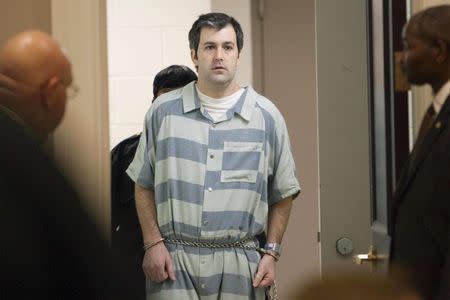 Former police officer Michael Slager walks to the defense table during a bond hearing, in Charleston, South Carolina, in this file photo taken September 10, 2015. REUTERS/Randall Hill/Files