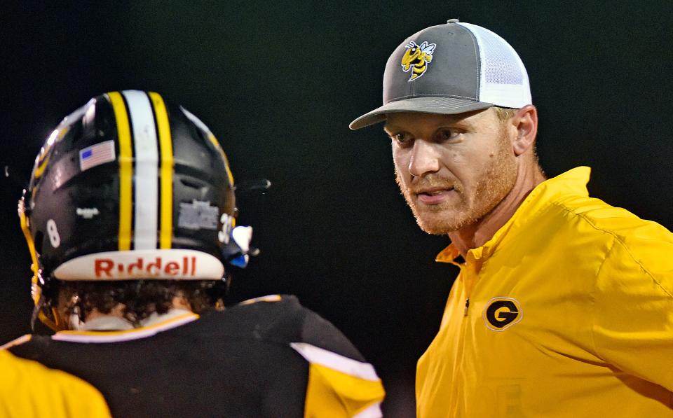 Glencoe coach Jamison Wadley talks with a player during high school football action against Hokes Bluff on Friday, Sept. 17, 2021, at Glencoe.