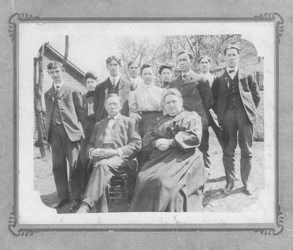The William Reed family at their Malvern home. Seated is William and Eliza Reed and standing are their children (left to right) John Reed, Iva (Reed) Logan, Joe Reed, Frank Lewis Reed, Carrie (Reed) Worley, Jettie (Reed) Gween, Bert Reed, Bill Reed and Bob Reed.