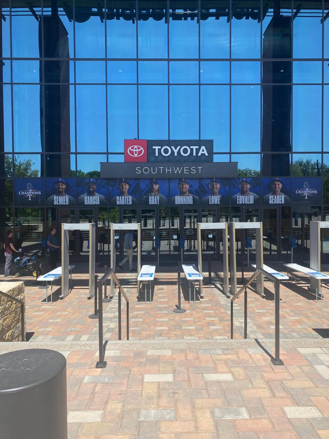 Southwest entrance at Globe Life Field displaying a banner commemorating the 2023 World Series victory. Lawrence Dow