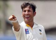 Pakistan's Yasir Shah celebrates after taking the wicket of Sri Lanka's Lahiru Thirimanne (not pictured) during the second day of their second test cricket match in Colombo June 26, 2015. REUTERS/Dinuka Liyanawatte