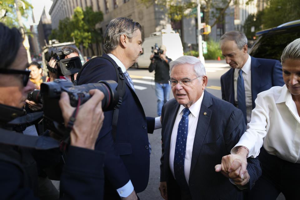 Democratic U.S. Sen. Bob Menendez of New Jersey and his wife Nadine Menendez arrive to the federal courthouse in New York, Wednesday, Sept. 27, 2023. Menendez is due in court to answer to federal charges alleging he used his powerful post to secretly advance Egyptian interests and carry out favors for local businessmen in exchange for bribes of cash and gold bars. (AP Photo/Seth Wenig)