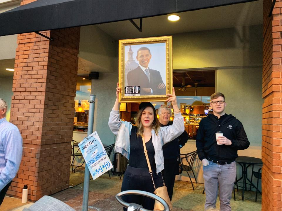 A woman holds up a portrait of Barack Obama at an O’Rourke rally in Houston. (Photo: Holly Bailey/Yahoo News)