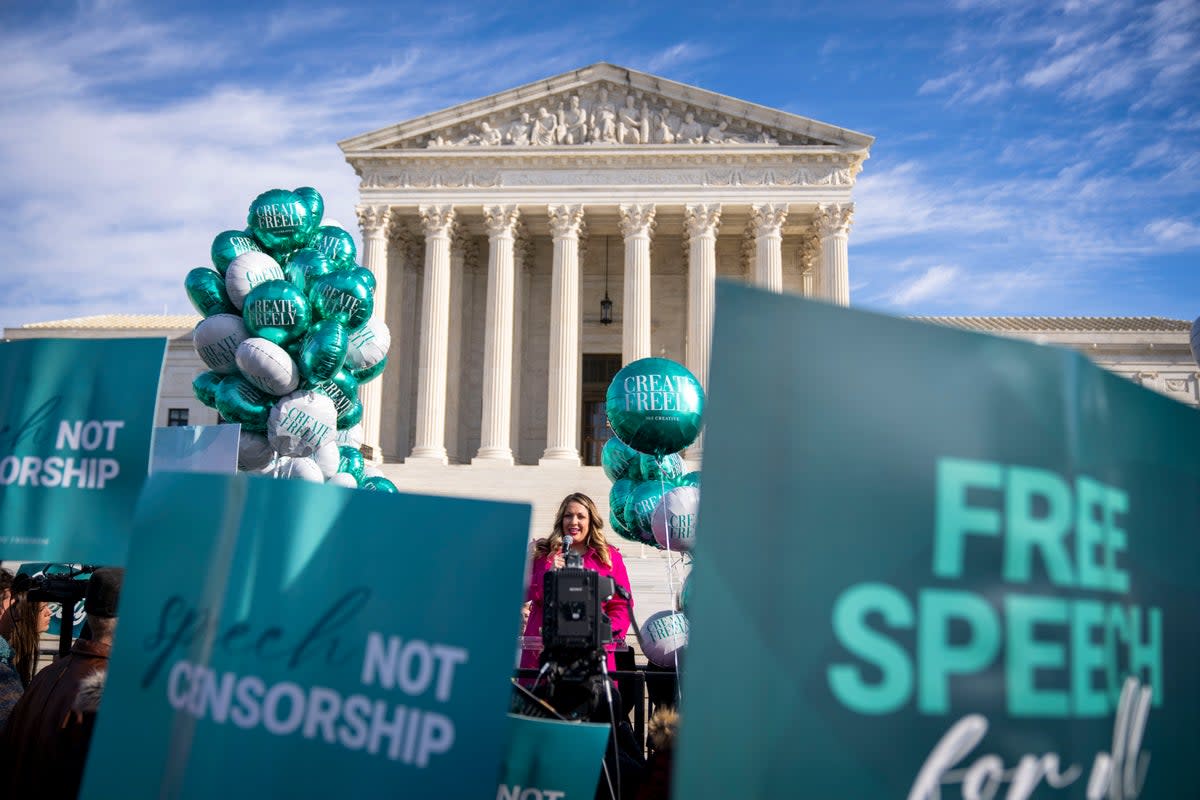 Protestors in favor of Lorie Smith convene outside of the Supreme Court after oral arguments in December (AP)