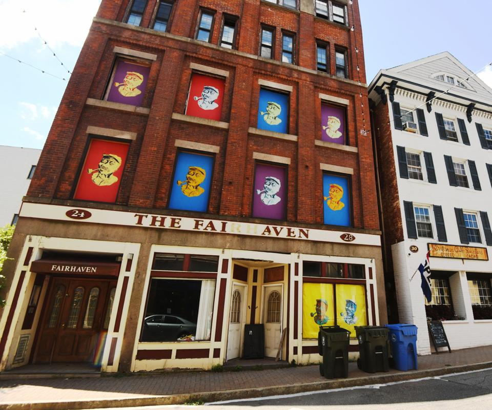 Window art on the Fairhaven building on Broadway in downtown Norwich.