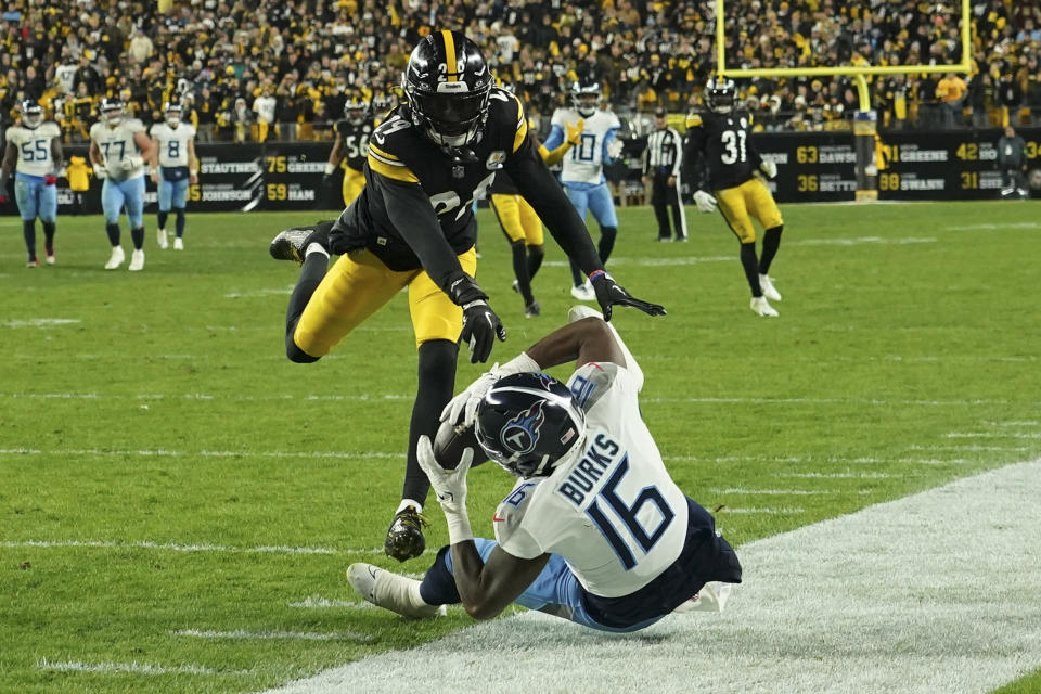 Tennessee Titans wide receiver Treylon Burks (16) is injured as he falls to the ground as Pittsburgh Steelers cornerback Levi Wallace (29) defends during the second half of an NFL football game Thursday, Nov. 2, 2023, in Pittsburgh. (AP Photo/Matt Freed)