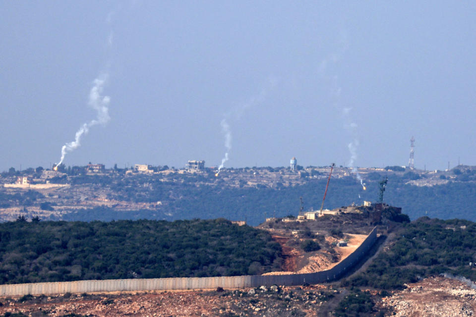 Flares are fired from northern Israel over the southern Lebanese border village of Aita al-Shaab. (Fadel Senna / AFP - Getty Images)