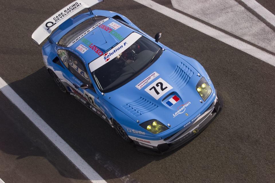 a blue race car on a track