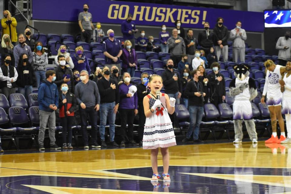 Kinsley Murray, 6, performs the national anthem at a sporting event