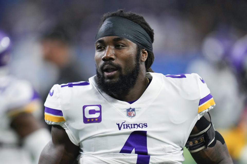 FILE - Minnesota Vikings running back Dalvin Cook (4) runs on the field before an NFL football game against the Detroit Lions in Detroit, on Dec. 11, 2022. The Minnesota Vikings are parting ways with the star running back for salary cap savings after his fourth consecutive season surpassing the 1,000-yard rushing mark. Cook has been informed he will be released, a person familiar with the team’s decision told The Associated Press on Thursday, June 8, 2023. (AP Photo/Paul Sancya, File)