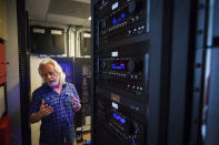 FILE - In this Oct. 10, 2012, file photo, Michael Bleyzer's talks in the control center that operates his network based 15,000-square-foot house overlooking a wooded nature preserve on the banks of Buffalo Bayou and designed by the firm Stern & Bucek, in Houston. The Bleyzer House was on American Institute of Architects Home Tour 2012. Bleyzer and Alex Cranberg, two political supporters of Energy Secretary Rick Perry secured a potentially lucrative oil-and-gas exploration deal from the Ukrainian government soon after Perry proposed one of the men as an adviser to the country’s new president. (Houston Chronicle via AP)