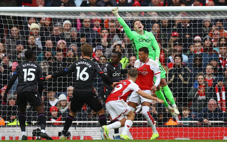 Palace's Dean Henderson reacts as he jumps above Arsenal's Ben White before Gabriel scores