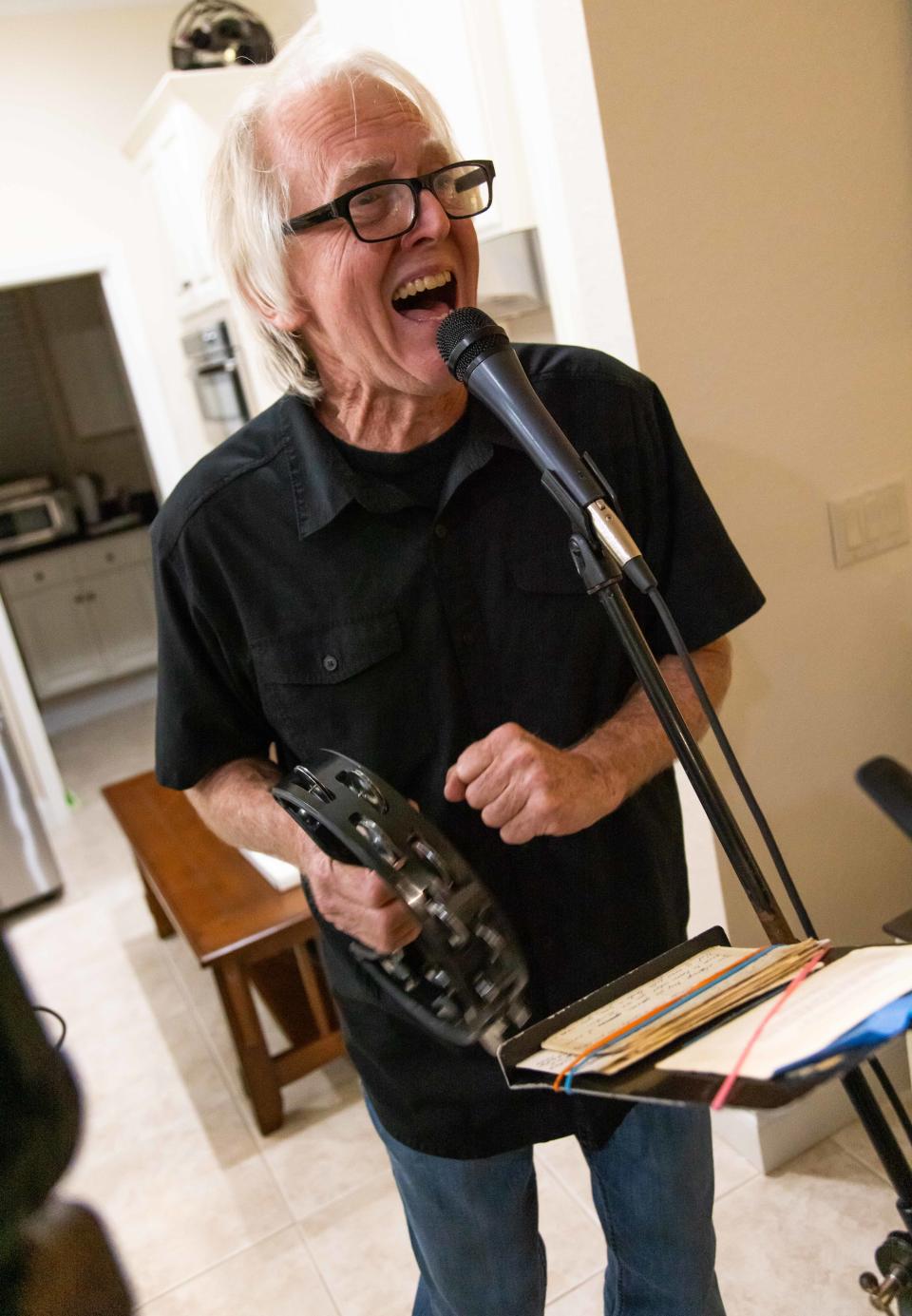 One Flite Up vocalist Craig Frazee sings “Roadhouse Blues” during a recent practice session.