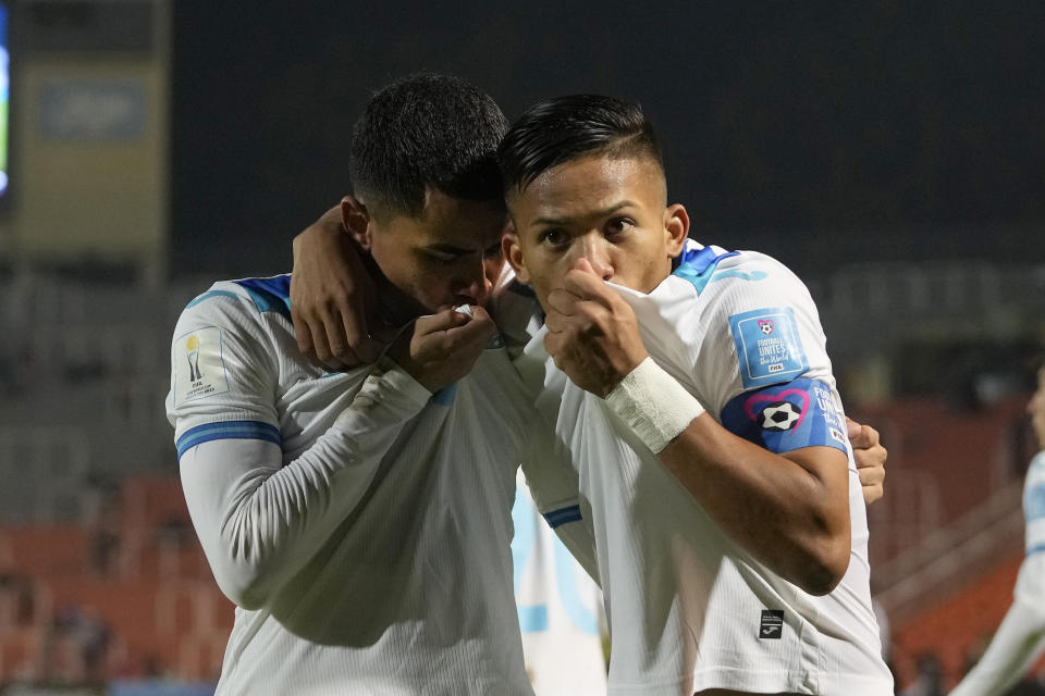 Honduras's Isaac Castillo, left, celebrates scoring his side's second goal with his teammate Tomas Sorto during a FIFA U-20 World Cup Group F soccer match against South Korea at the Malvinas Argentinas stadium in Mendoza, Argentina, Thursday, May 25, 2023. (AP Photo/Natacha Pisarenko)