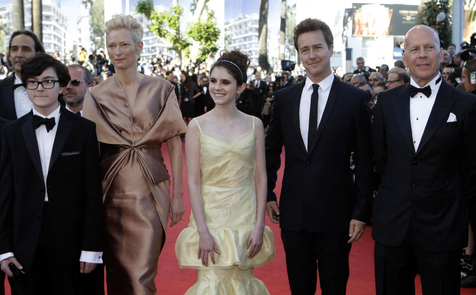 Cast members of Moonrise Kingdom, from left, Jared Gilman, Tilda Swinton, Kara Hayward, Edward Norton and Bruce Willis arrive for the opening ceremony and screening of Moonrise Kingdom at the 65th international film festival, in Cannes, southern France, Wednesday, May 16, 2012. (AP Photo/Lionel Cironneau)