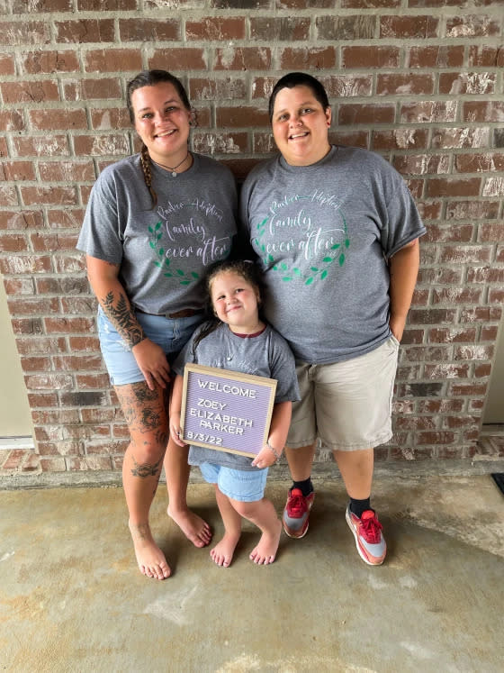 Emily and Jennie Parker, left to right, with their newly adopted daughter, Zoey. (Courtesy Jennifer Parker)