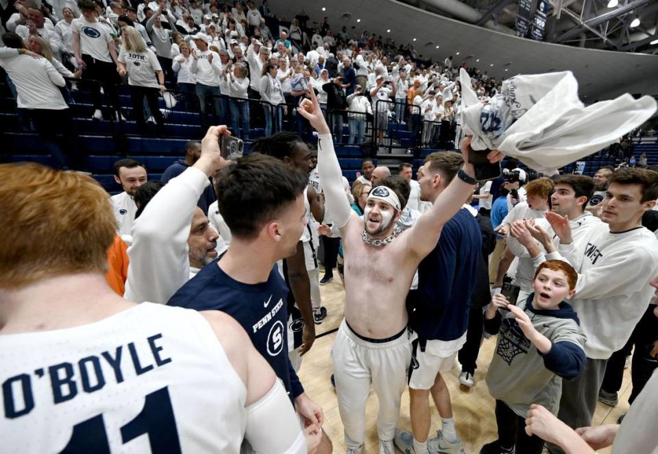 Penn State fans rush the court to celebrate the men’s basketball win over Illinois on Wednesday, Feb. 21, 2024 at Rec Hall. Abby Drey/adrey@centredaily.com