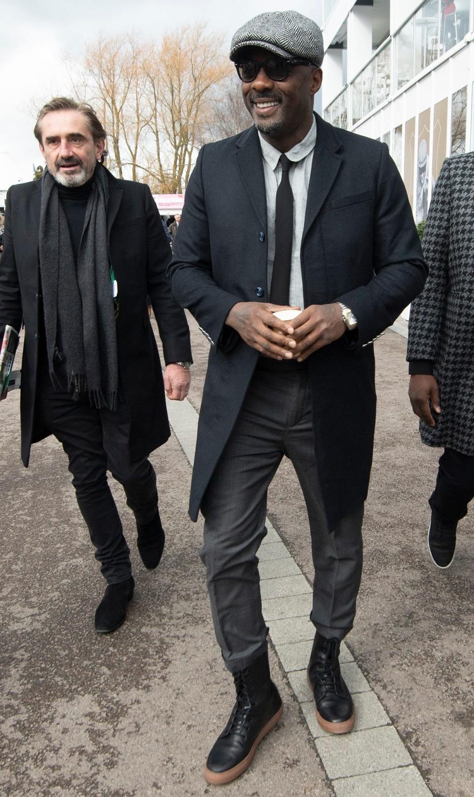Idris Elba captures the 'Peaky Blinders' look at Cheltenham Festival