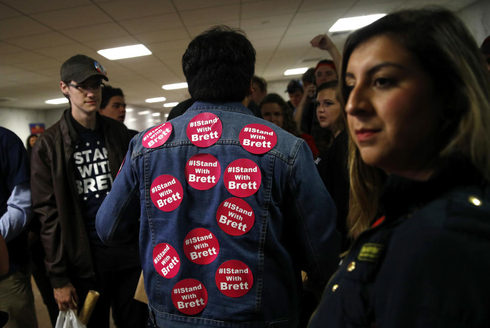 Supporters of Supreme Court nominee Brett Kavanaugh gather inside the Hart Senate Office Building on Capitol Hill in Washington, Thursday, Sept. 27, 2018. The Senate Judiciary Committee is hearing from Christine Blasey Ford, the woman who says Kavanaugh sexually assaulted her. (AP Photo/Patrick Semansky)