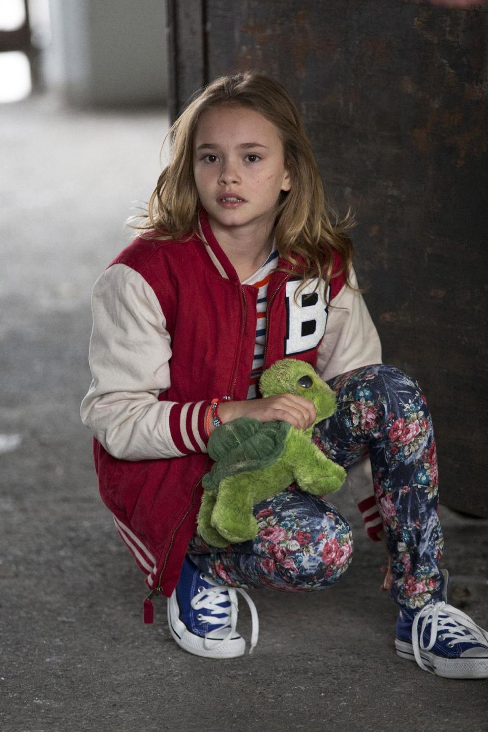 This photo released by NBC shows, Johnny Sequoyah as Bo, in the pilot of the new NBC television series, "Believe." Alfonso Cuaron and J.J. Abrams ("Lost," the "Star Trek" movies) are executive producers of "Believe," a drama about a child whose supernatural powers put her and the world at risk. (AP Photo/NBC, Eric Liebowitz)