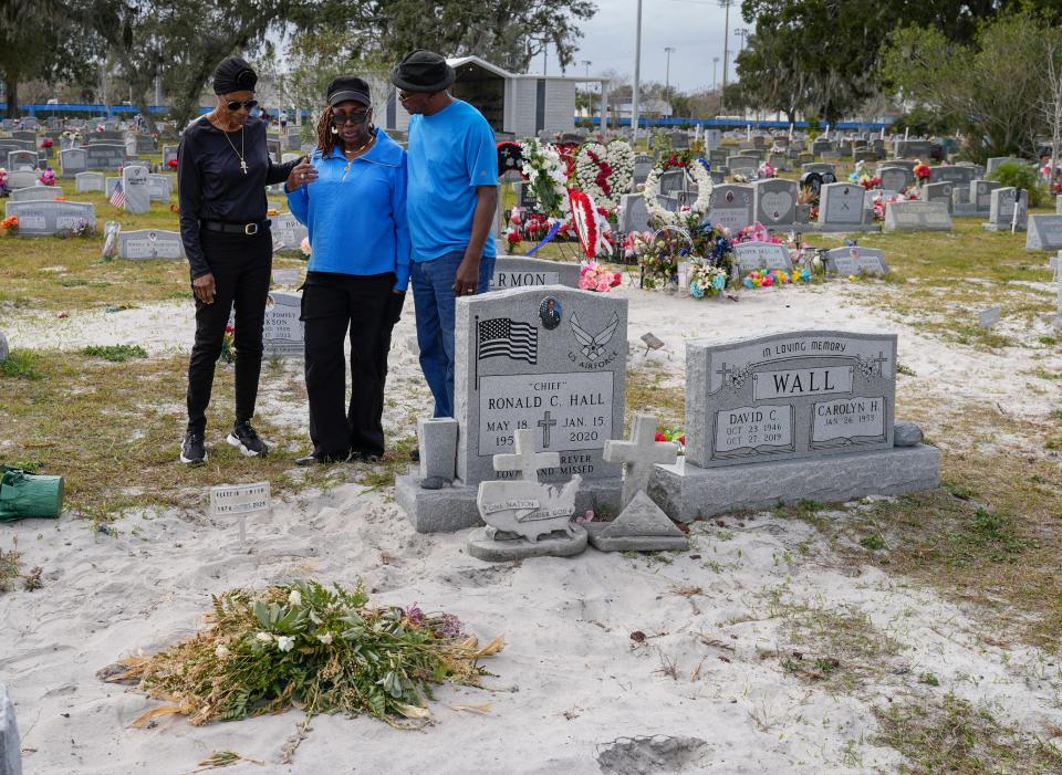 Just when Pamela Hall thought her nightmare couldn't get any worse, it did. Three days after her daughter, Eleecia Smith, was buried, Hall learned Smith was interred in the wrong gravesite at Greenwood Cemetery in Daytona Beach. Hall is pictured at the cemetery with Smith's aunt, Dianne Gibson, and her brother, Bobby Smith.