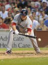 CHICAGO, IL - JUNE 16: Jon Lester #31 of the Boston Red Sox tries to sacrifice bunt in the seventh inning against the Chicago Cubs on June 16, 2012 at Wrigley Field in Chicago, Illinois. (Photo by David Banks/Getty Images)