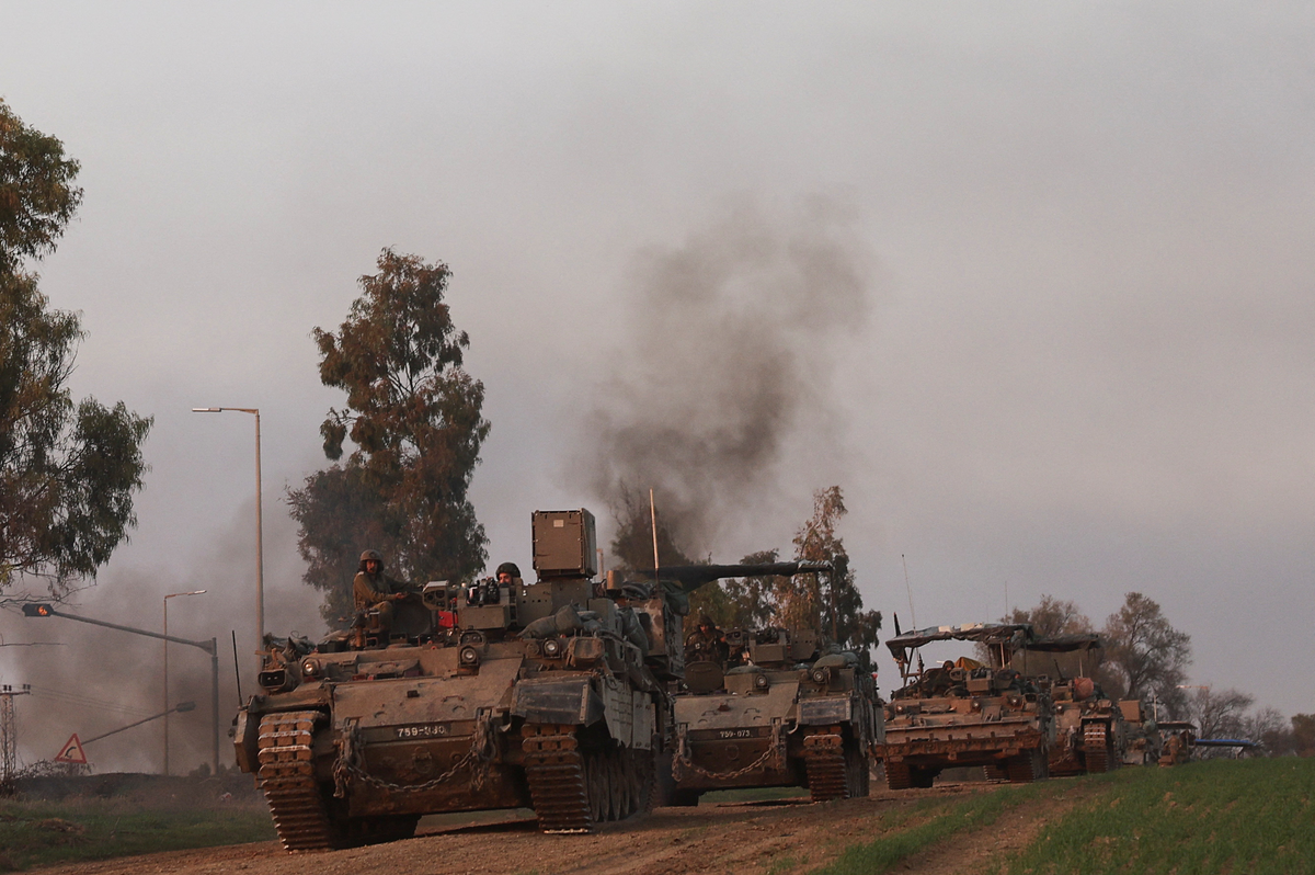 Israeli soldiers operate near the Israel-Gaza border (REUTERS)