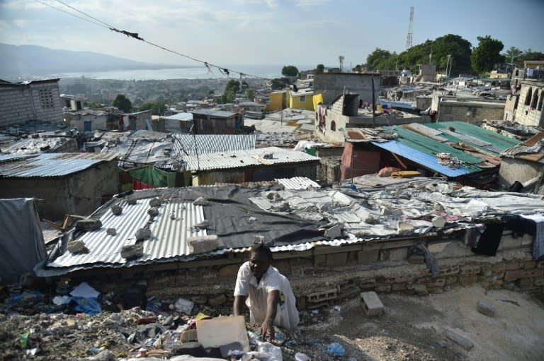 In the Fort-National area of Port-au-Prince, barely a kilometer (half a mile) from the presidential palace, tiny cement-block homes and makeshift shelters fashioned from plastic and tarps line the narrow, trash-filled lanes -- doused in raw sewage