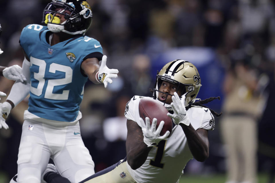New Orleans Saints wide receiver Marquez Callaway (1) pulls in a touchdown reception against Jacksonville Jaguars cornerback Tyson Campbell (32) in the first half of an NFL preseason football game in New Orleans, Monday, Aug. 23, 2021. (AP Photo/Brett Duke)