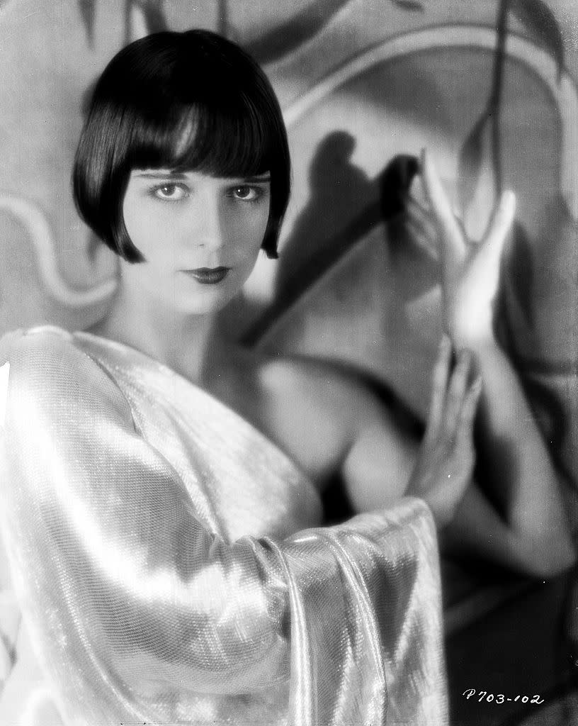 Portrait of actress Louise Brooks (1906-1985) wearing a one-shoulder dress, for Paramount Pictures, 1929. (Photo by Eugene Robert Richee/John Kobal Foundation/Getty Images)